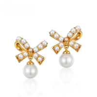 wholesale Metal material new Korean ear accessories sense pearl bow earrings cute internet-famous temperament small fresh ear studs new delicate-925 silver