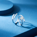 wholesale Silver couple rings, a pair of minimalist and elegant unisex matching bands with a lightweight luxury design, featuring a single diamond and an open-ended style-0-0