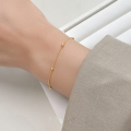 wholesale S925 Silver minimalist and versatile design small fresh bead rotating bead bracelet with gold bean accents S7298-0-1