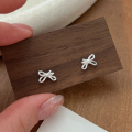 wholesale Metal minimalist bow ear studs for women, small and fashionable, delicate earrings, fresh and-0-5