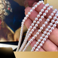 wholesale 18K gold minimalist and luxurious Akoya seawater pearl strand necklace with small rice pearls, perfectly round and lustrous, featuring a high-gloss clasp-White translucent powder>3-3.5mm (freshwater beads)