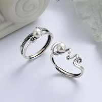 wholesale S925 Sterling Silver Korean-style Asymmetric Five-point Star Interwoven Pearl Line Open Ring for Women-YFJ418/A model is about 2.36 grams. The opening is adjustable.