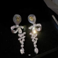 wholesale Glittering golden teardrop gemstone bow earrings with full diamonds, luxurious and elegant, high-end European royal retro earrings-0-1