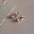 wholesale Metal material cross-border French vintage knot pearl earrings niche design high-end sense temperament versatile elegant earrings wholesale-0-2