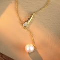 wholesale Metal Material: 925 Silver, Shell, Pearl  
Pendant Style: Shell Pearl Necklace, Tassel Snake Chain Sweater Chain  
Season: Autumn/Winter  
Customization: Available-0-2